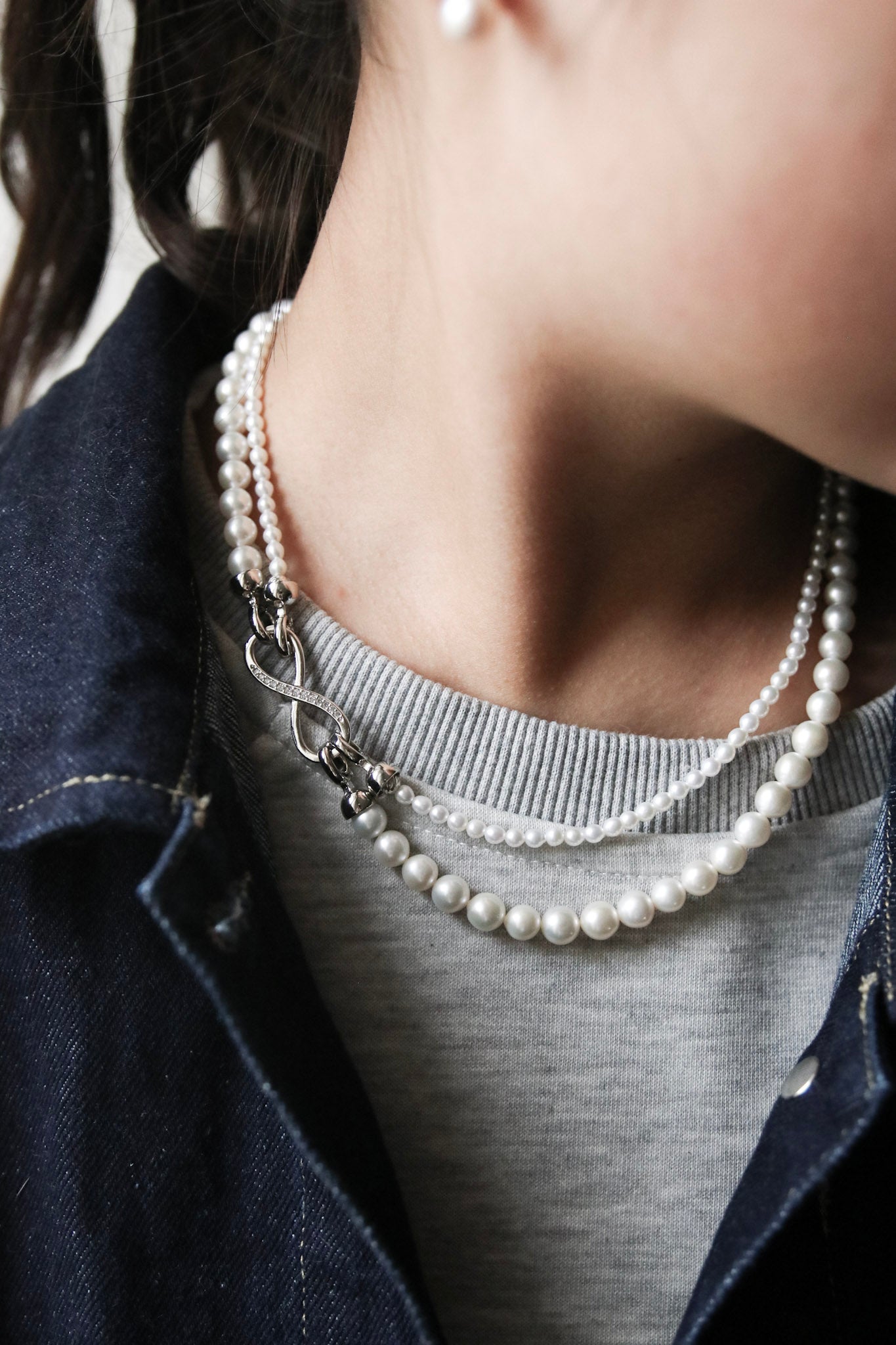 Thanks to its unique figure-8 clasp, both the fine and the bold pearl strands can be detached — giving you four elegant ways to wear it