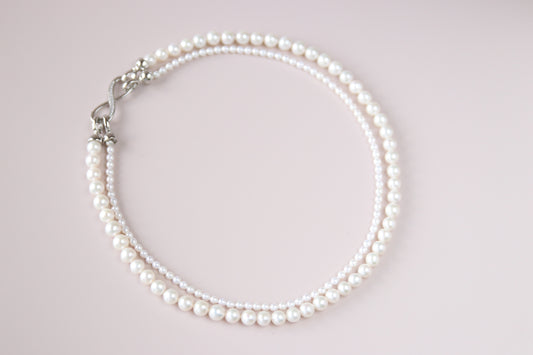 Thanks to its unique figure-8 clasp, both the fine and the bold pearl strands can be detached — giving you four elegant ways to wear it